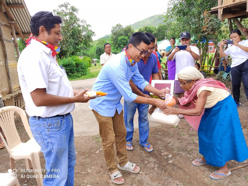 Relief Committee members with a Beneficiary